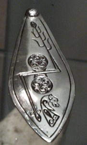 Silver plaque from the Norrie's Law hoard, Fife, with double disc and Z-rod symbol - Wikipaedia 