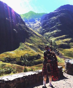 A Piper at Glencoe, site of English treachery and massacre of Clan MacDonald, 1692