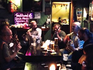 Friday night at the Bridge Bar, Bundoran. Our host Connie, buxom bloke in blue checked shirt on a mean guitar